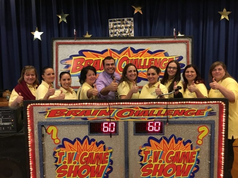 thumbs up from teachers after successful hollyrock game show at school