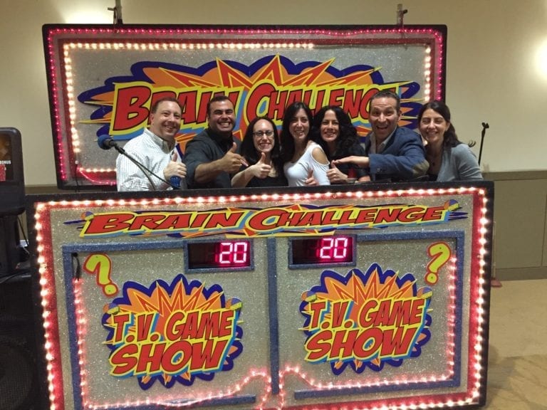 game show contestants happy after brain challenge